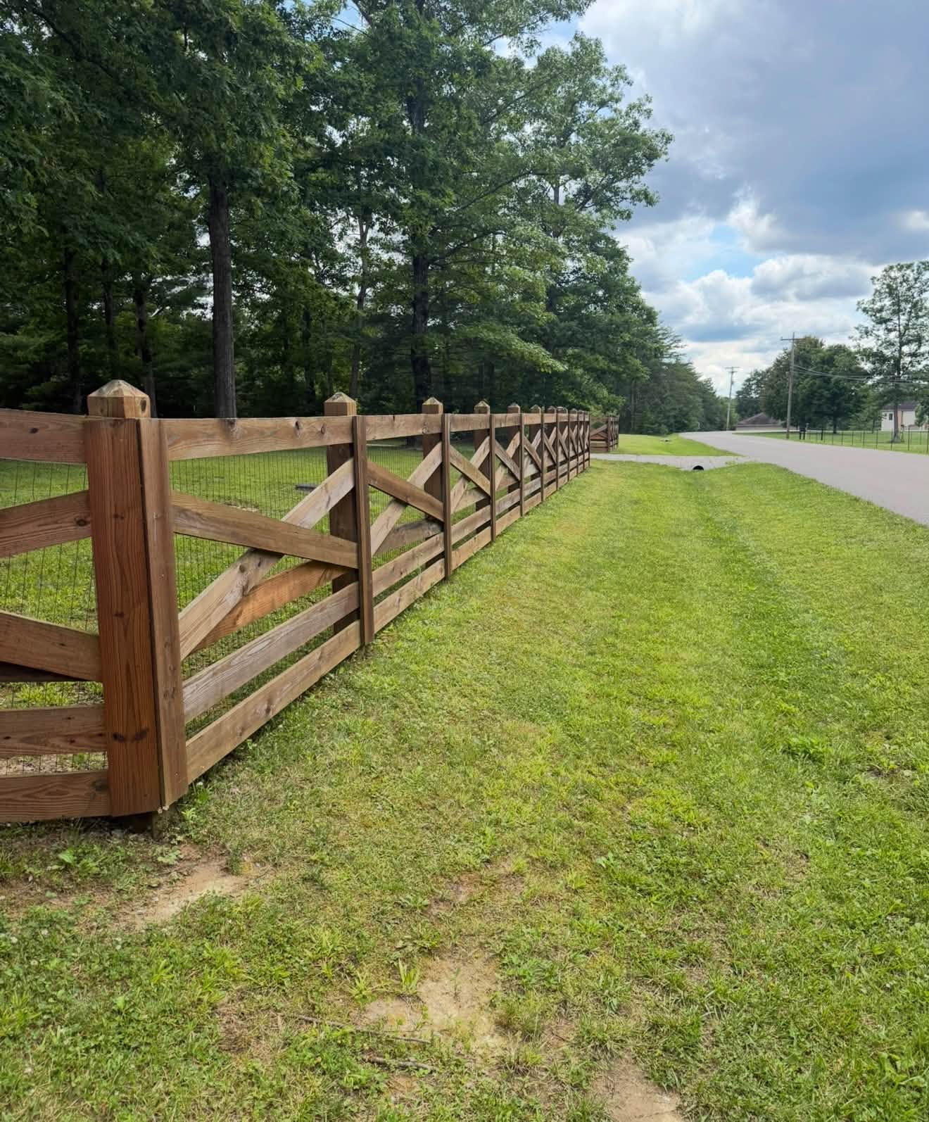 Ranch-style wood fence built by Tennessee Fence Systems