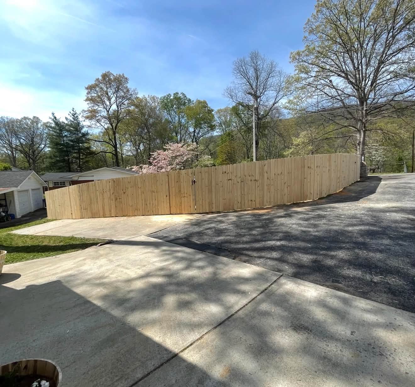 Wood driveway gate built by Tennessee Fence Systems